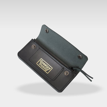 Roavan（ローバン） Gossipy Bunny（ゴシッピーバニー） Sodane（ソダネ） 長財布。国産ブラックレザーを使用し、スリムながら収納力に優れた本革ウォレット。カードやお札を整理しやすく、使うほどに艶が増すエイジングを楽しめる日本製レザーアイテム。